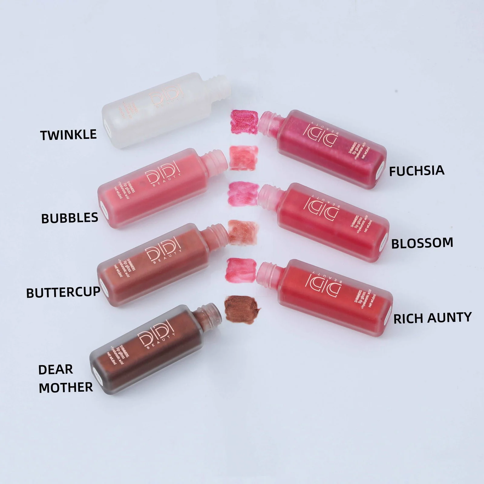 This Didi Beauty shimmer lip gloss with high shine feels as good as it looks—in Six Shimmer shades and a clear gloss. One luscious swipe of this lip gloss gives lips more to love, while hydrating hyaluronic acid that enriches from within. it has a non-sticky formula that’s super shiny and has an addictive chocolate scent. soak your lips in the shade of your choice—it’s the perfect finishing touch to every look